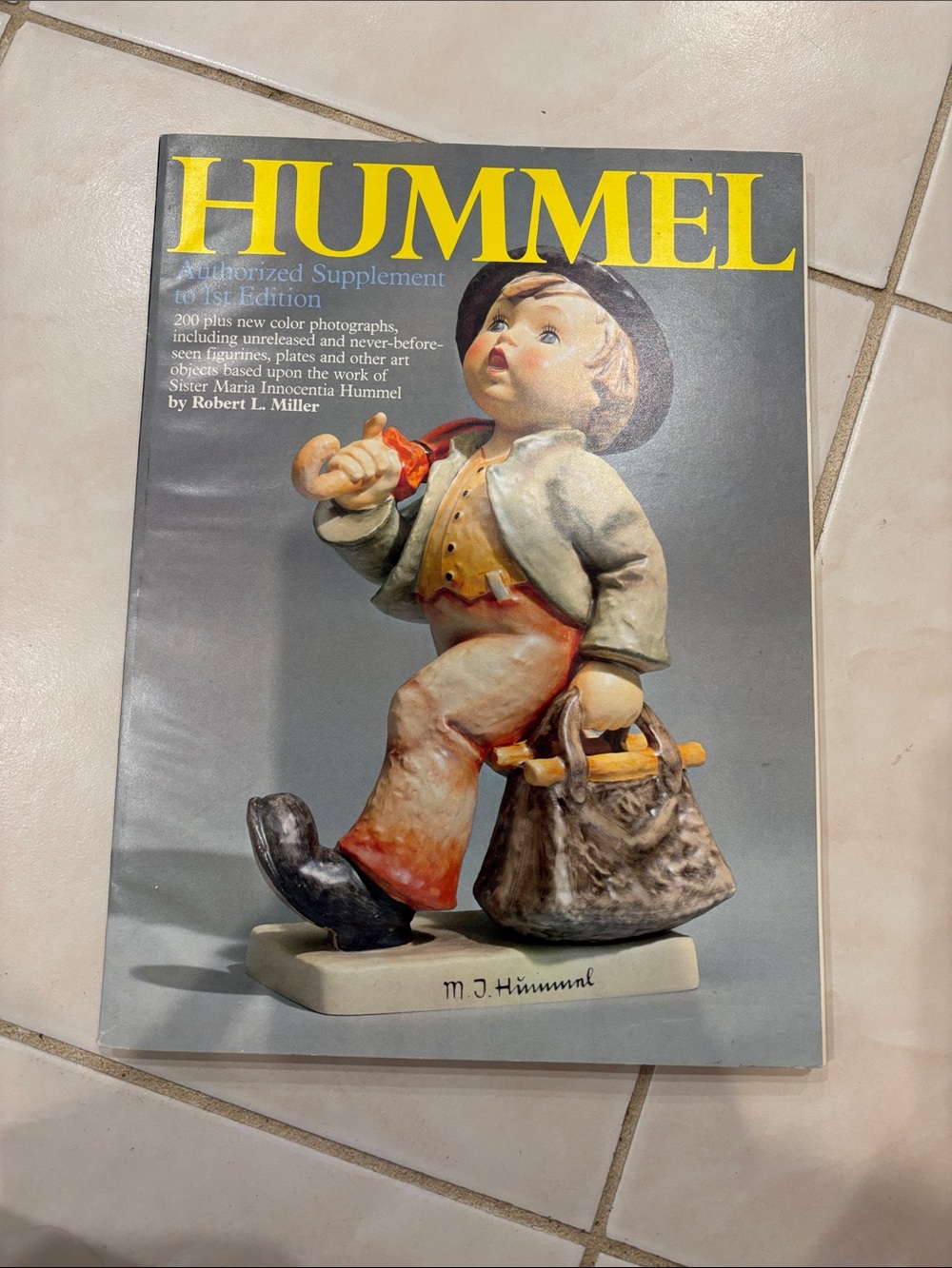 Hummel Gray Cover Art Book with Bold Yellow Title